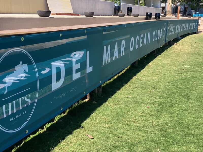 An image of a Del Mar mesh banner.